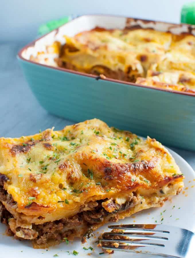 Lasagne without ricotta made with homemade white sauce and rich tomato meat sauce.