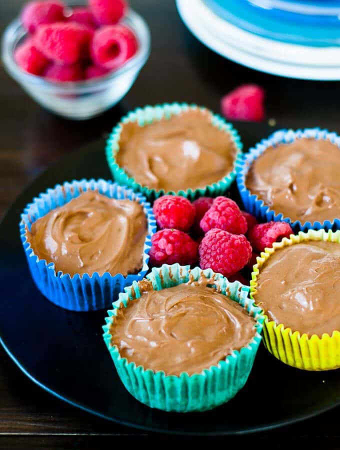Easy no bake sugar free chocolate cheesecake, rich and velvety, served with raspberries