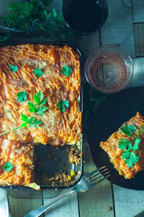 Baking dish with shepherds pie with a slice out